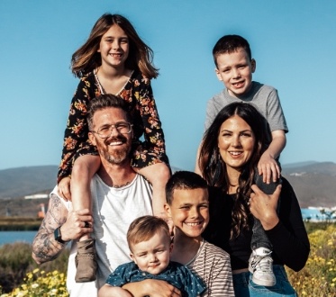 Family sharing healthy smiles after preventive dentistry visit