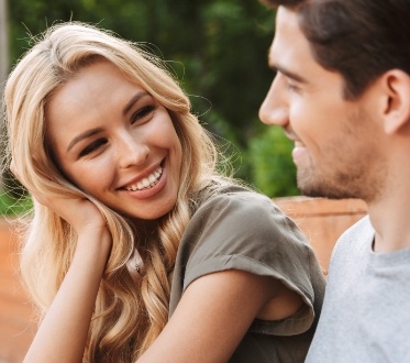 Woman with flawless smile after makeover