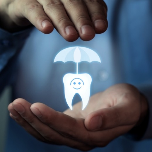 Hands holding animated tooth and umbrella